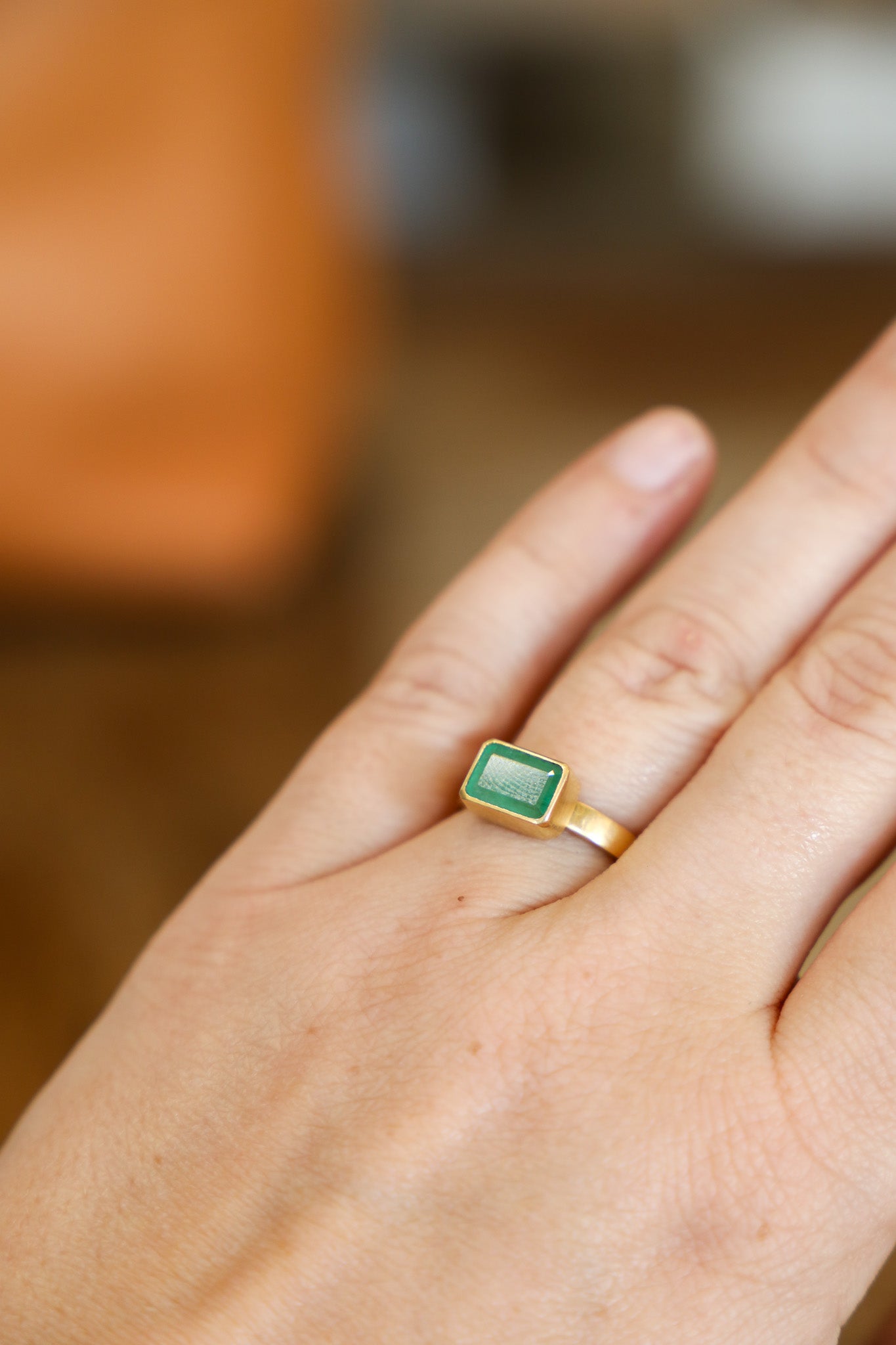 AF (C) 18k YG Faceted Emerald Ring