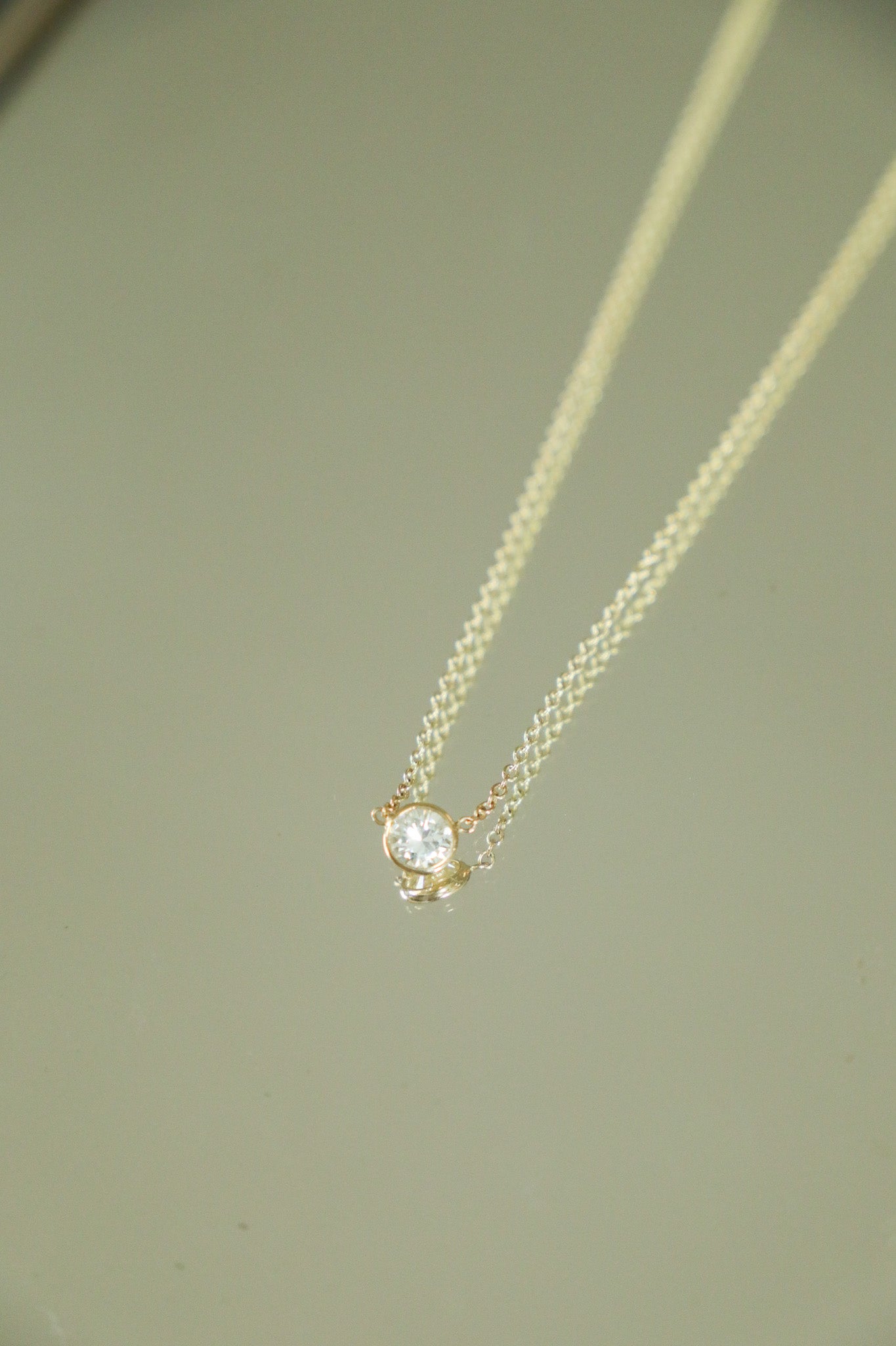 N045 - 14k YG 16-18" Necklace w/1 Bezel Set Round Diamond 0.50cts
