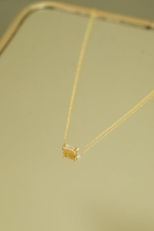 N042 - 14k YG 15-18" Chain w/1 Baguette Cut Diamond 0.29cts