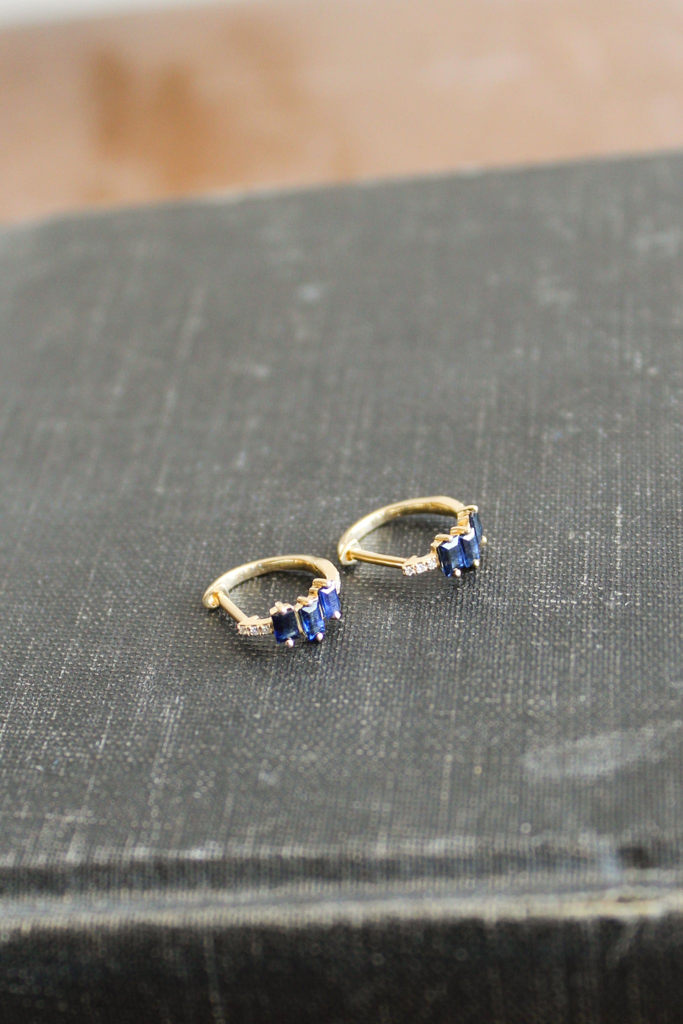 E206 - 14k YG 11mm Hoops w/12 Diamonds .02cts & 6 Baguette Sapphires .66cts