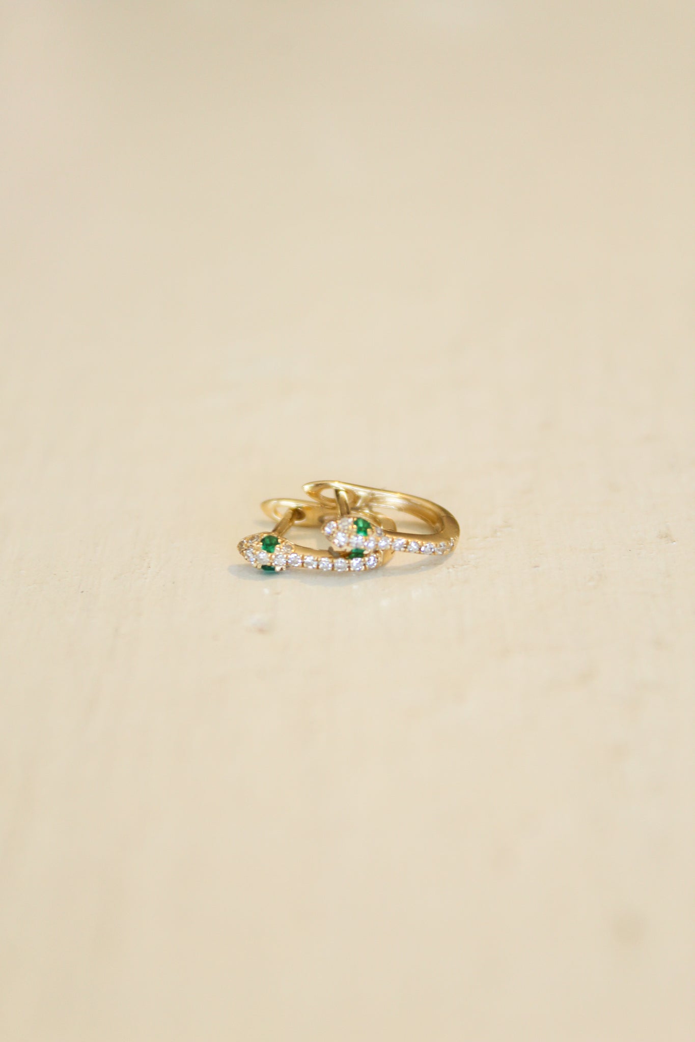 E045 - 14k YG Snake Earrings w/30 Diamonds .09ct & 4 Emeralds.
